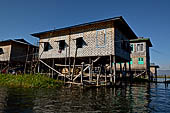 Inle Lake Myanmar. All the buildings are constructed on piles. Residents travel around by canoe, but there are also bamboo walkways and bridges over the canals, monasteries and stupas. 